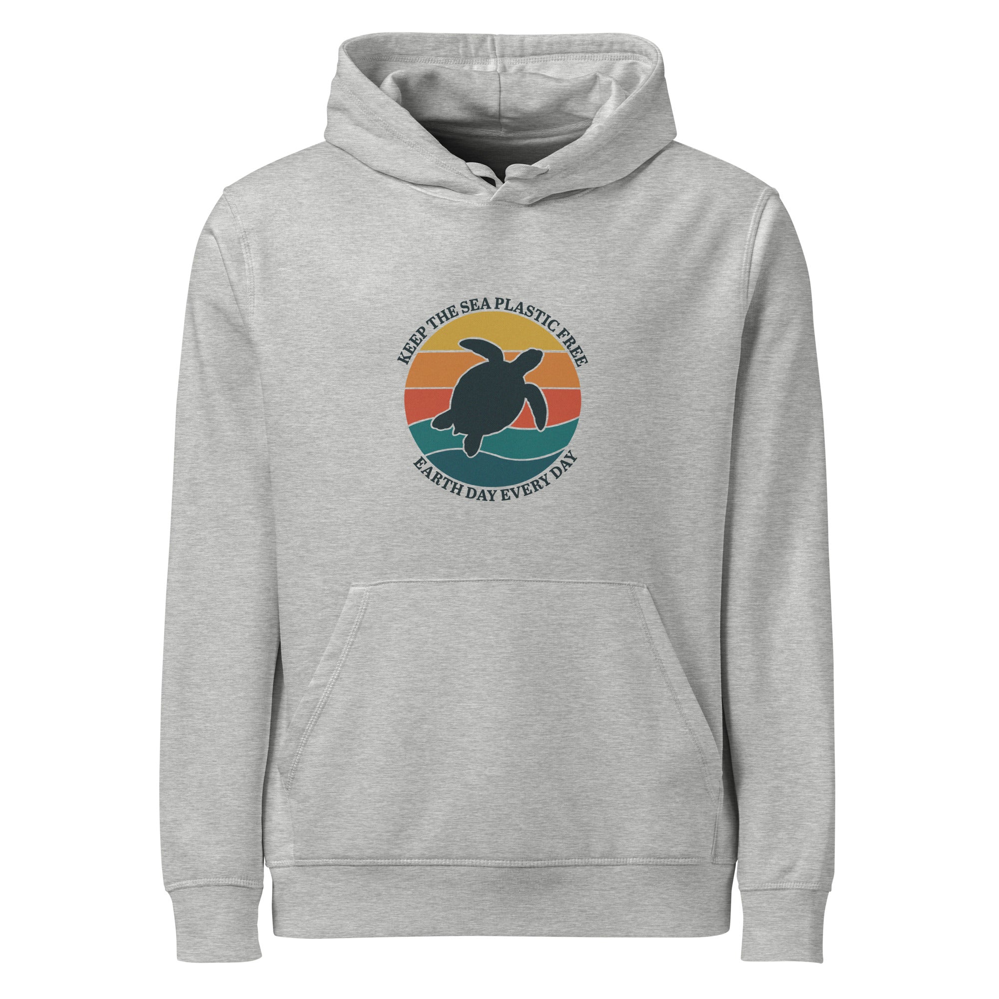 A front-facing flat lay of the heather grey organic hoodie. The image highlights the center kangaroo pocket, adjustable drawstrings, and the colorful retro-style turtle graphic centered on the chest.