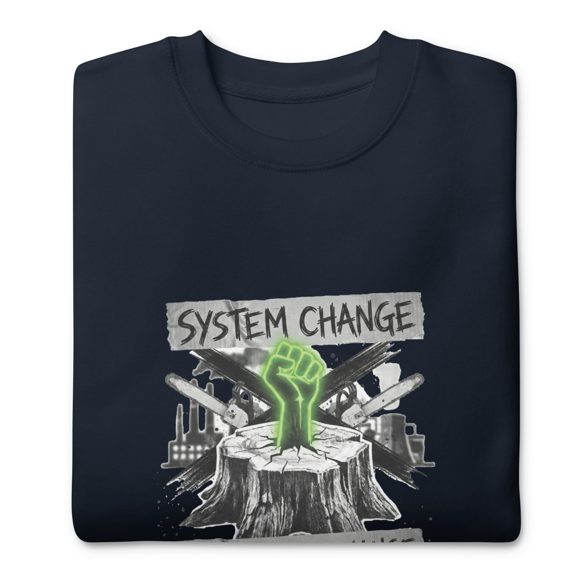 A close-up, angled shot of the navy blue sweatshirt folded neatly on a white surface. The focus is on the vibrant neon green fist detail and the distressed texture of the printed graphic.