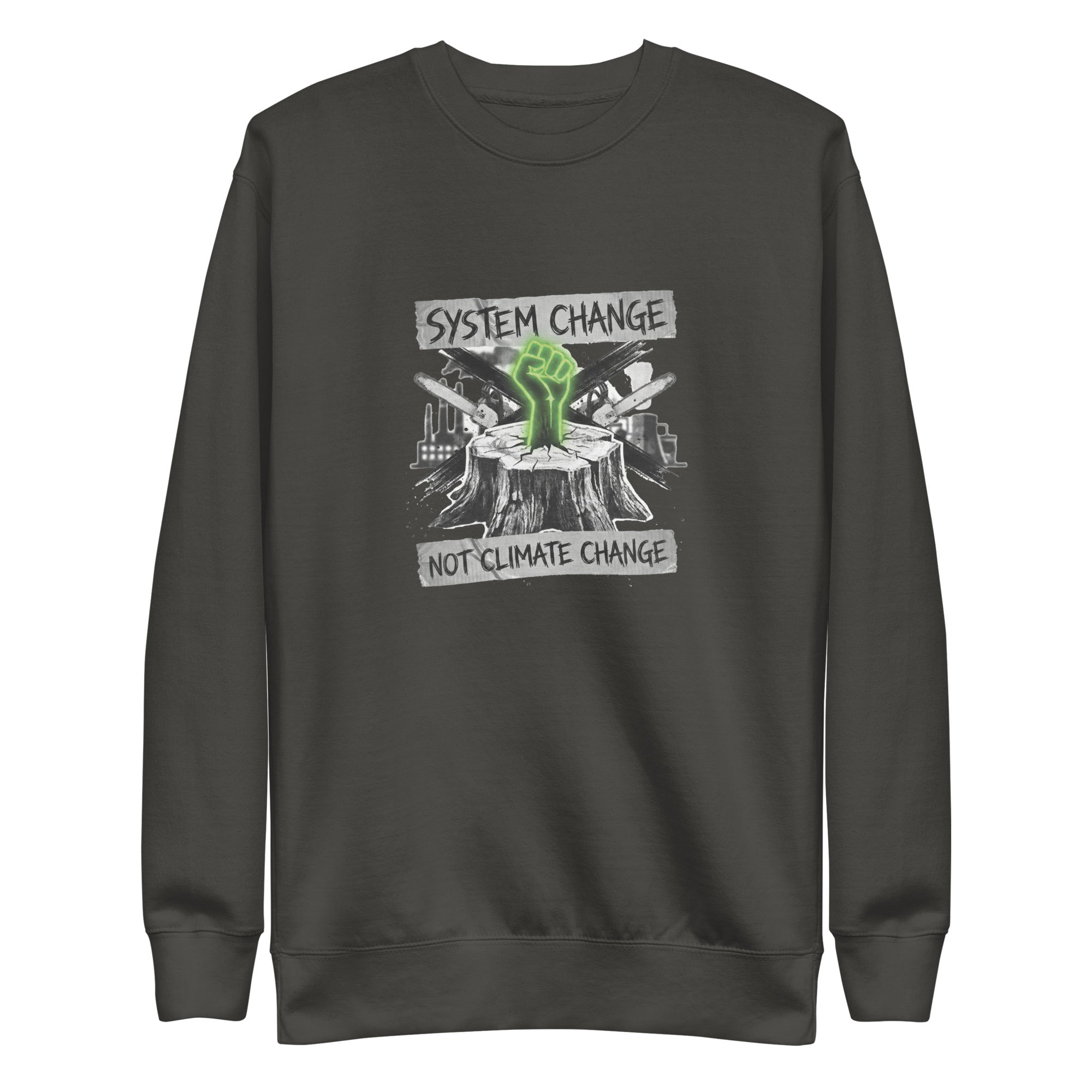 A high-resolution front view of a vintage black organic sweatshirt. The central graphic features a neon green glowing fist rising from a tree stump, set against a backdrop of crossed chainsaws and an industrial factory skyline. Banners above and below the graphic read "SYSTEM CHANGE" and "NOT CLIMATE CHANGE" in a distressed font.