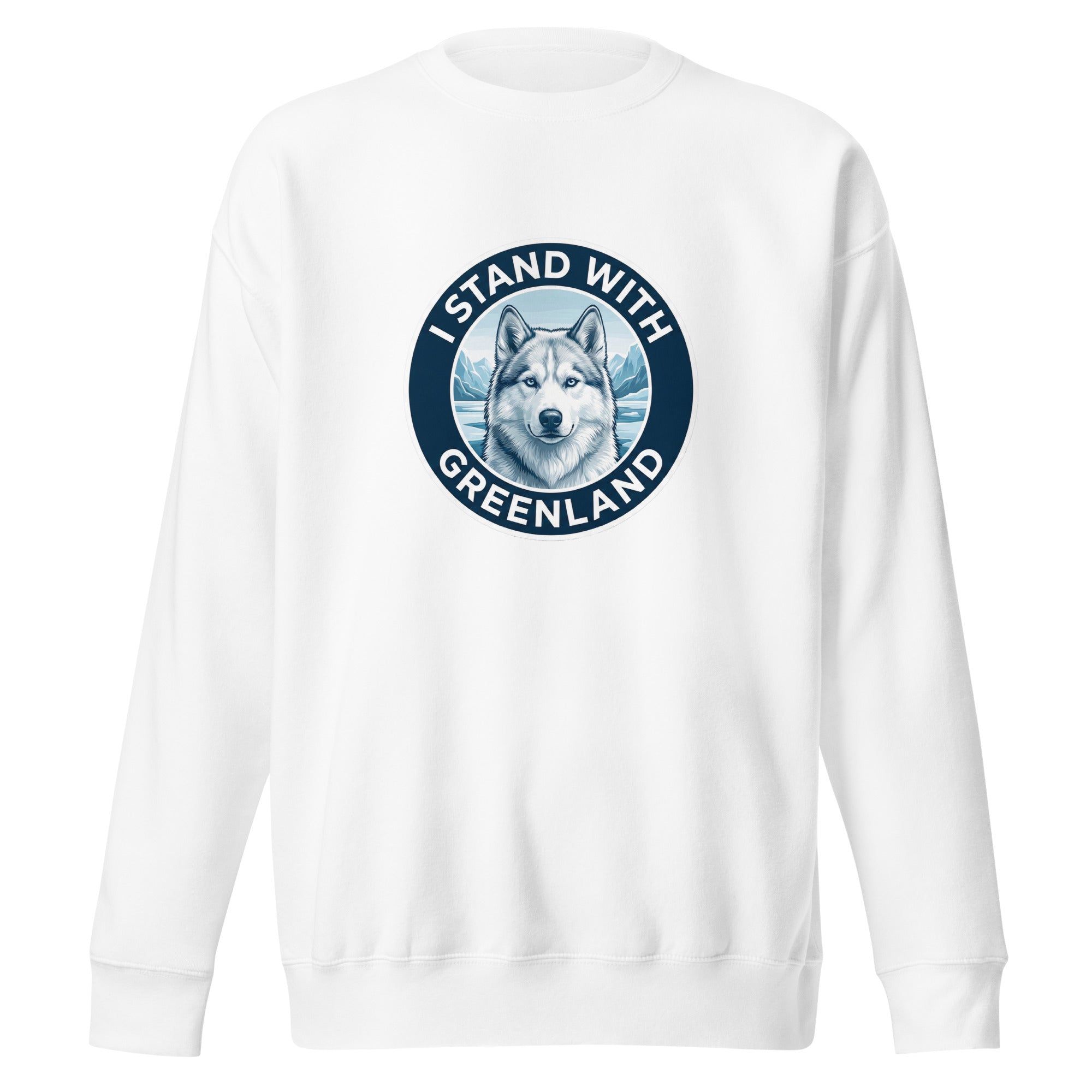 A white long-sleeved crew-neck sweatshirt laid flat against a white background, featuring a centered circular navy blue emblem with a husky's face and the words "I STAND WITH GREENLAND."